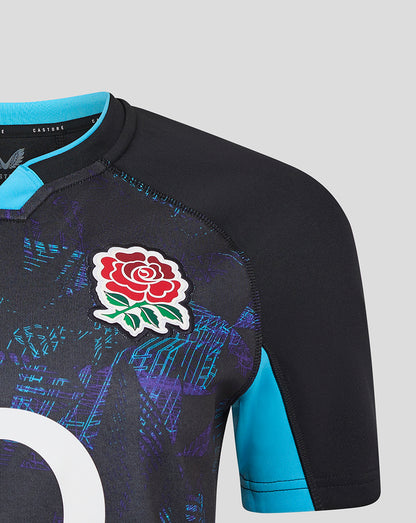 Close-up of Womens England Rugby Alternate shirt in black with blue collar, rose crest on left chest, O2 logo center and Castore branding on right chest.