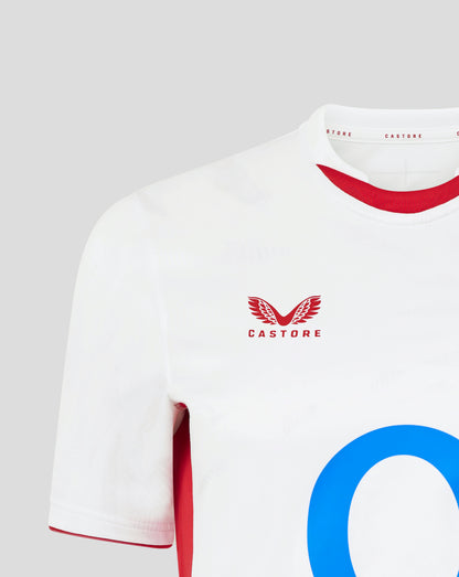 Close up of the white England Rugby home shirt showing the red rose crest on the chest and Castore branding along the collar seam