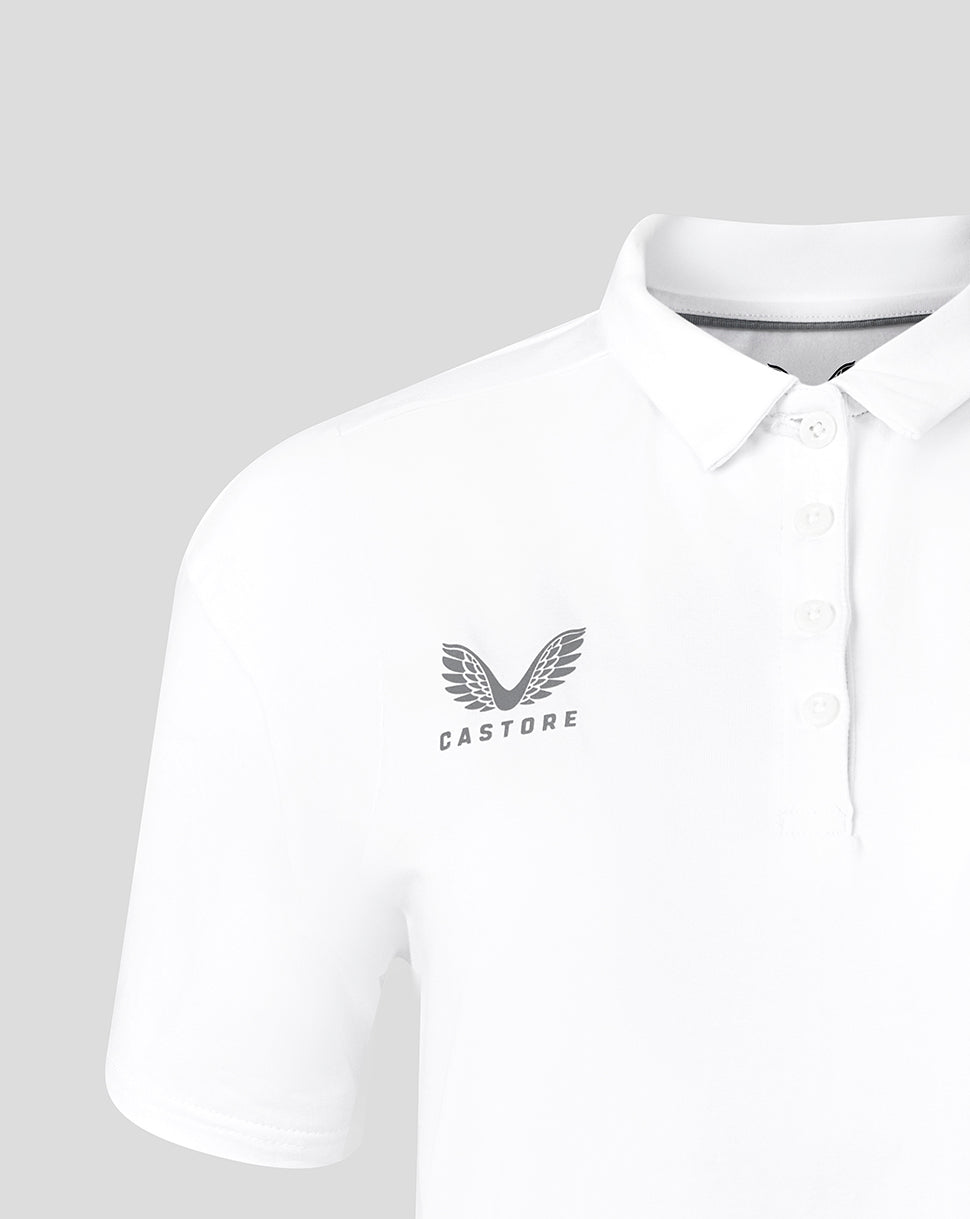 White polo with Castore wing logo on left chest and Saracens crest on right chest