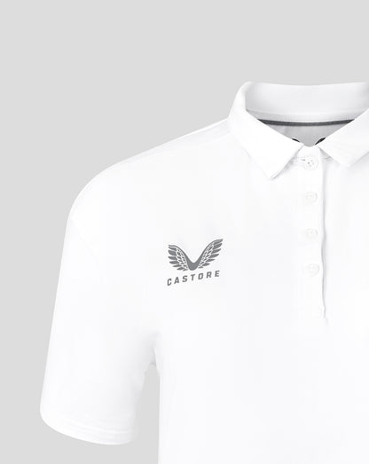 White polo with Castore wing logo on left chest and Saracens crest on right chest