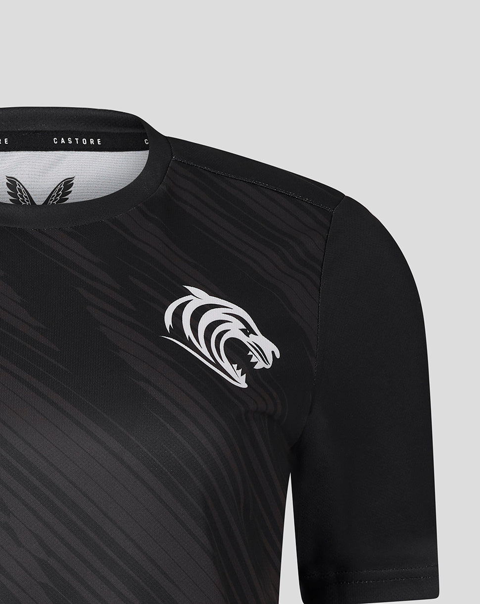 Front close-up of Leicester Tigers women's 25/26 warm up T-shirt in black with a white tiger head logo and diagonal pattern.