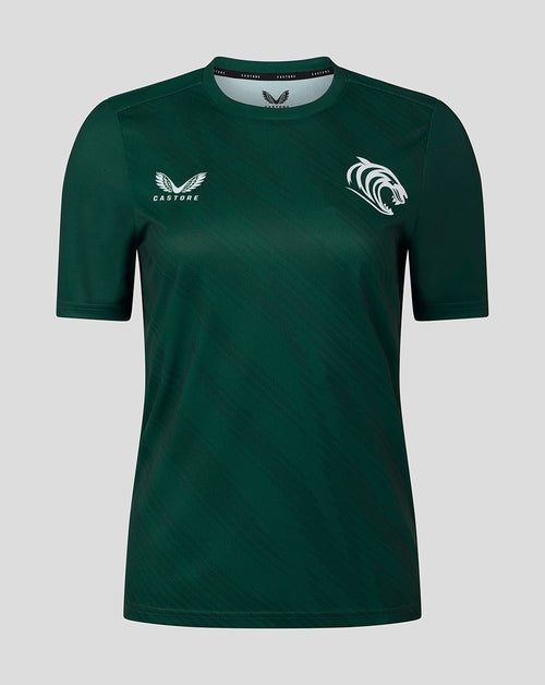 Front view of a dark green Leicester Tigers women's warm up T-shirt with Castore logo on the left and tiger crest on the right