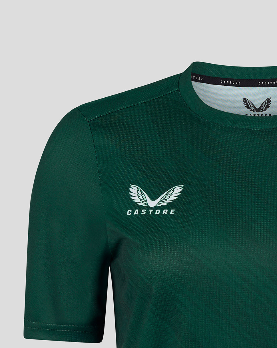 Close-up of Leicester Tigers women's 25/26 warm up T shirt in dark green with a white winged Castore logo on the chest