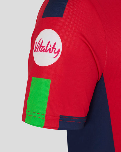Red sports jersey with 'Vitality' logo on a gray background