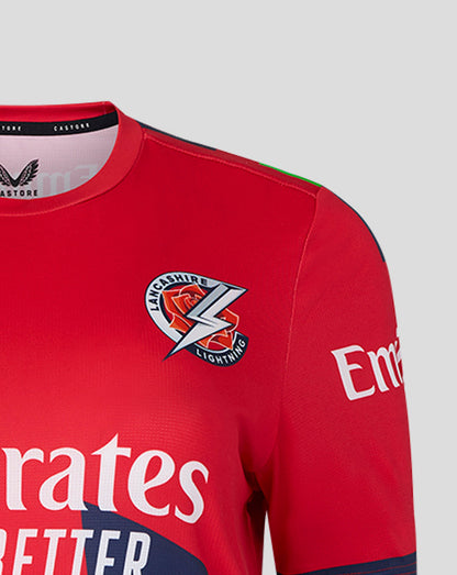 Red jersey chest showing Lancashire Lightning crest and Emirates sponsor across front.