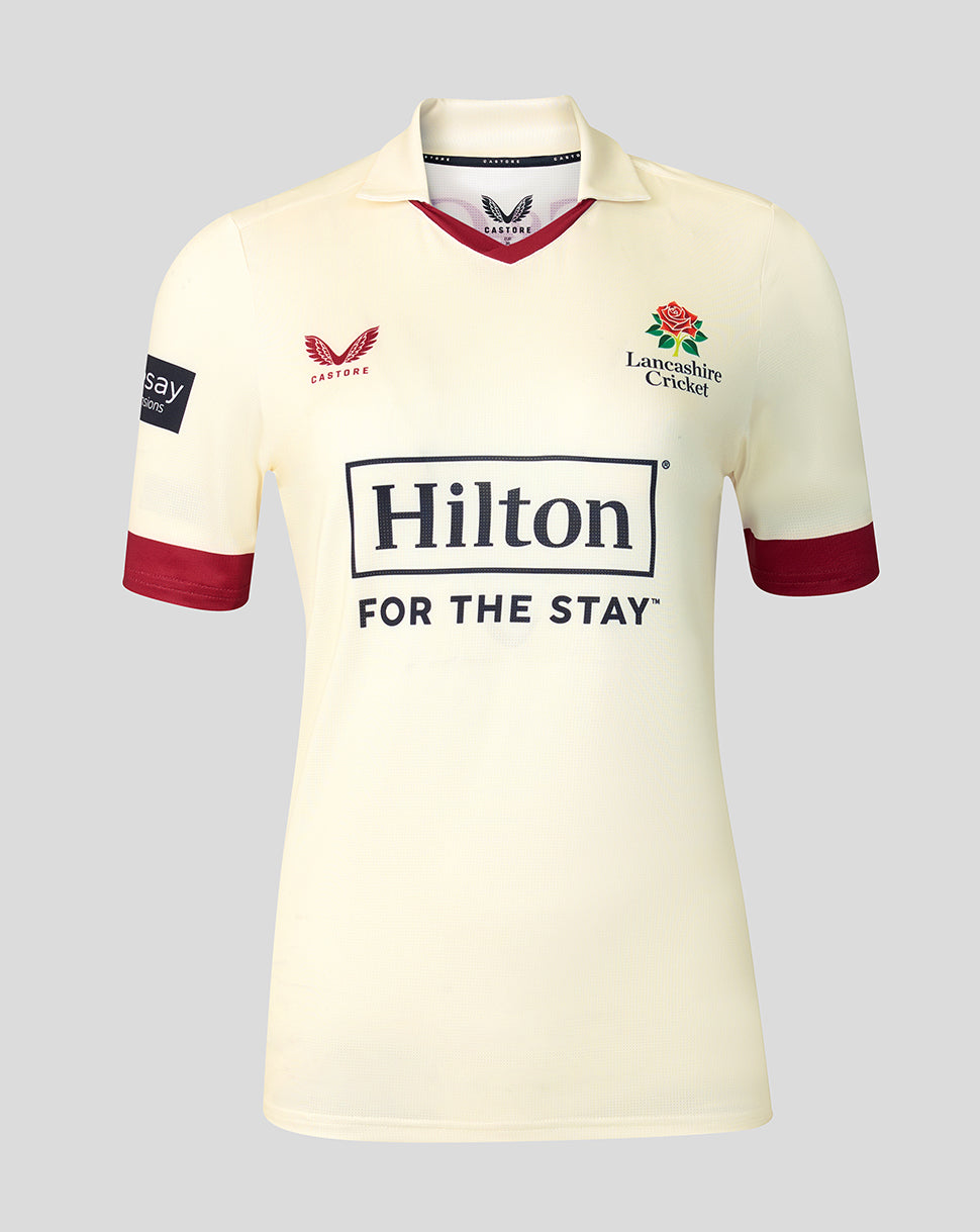 Cream Lancashire county cricket short sleeve jersey with maroon trim at cuffs and V neck featuring the crest and Hilton sponsor.