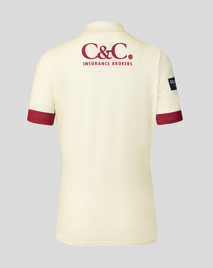 Back view of cream County Champs Jersey with C&C Insurance Brokers logo and maroon sleeve trim