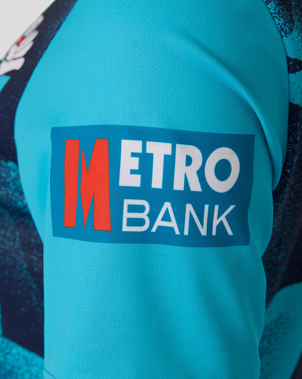 Detail of turquoise sleeve with Metro Bank logo on the Aquarius ODI jersey