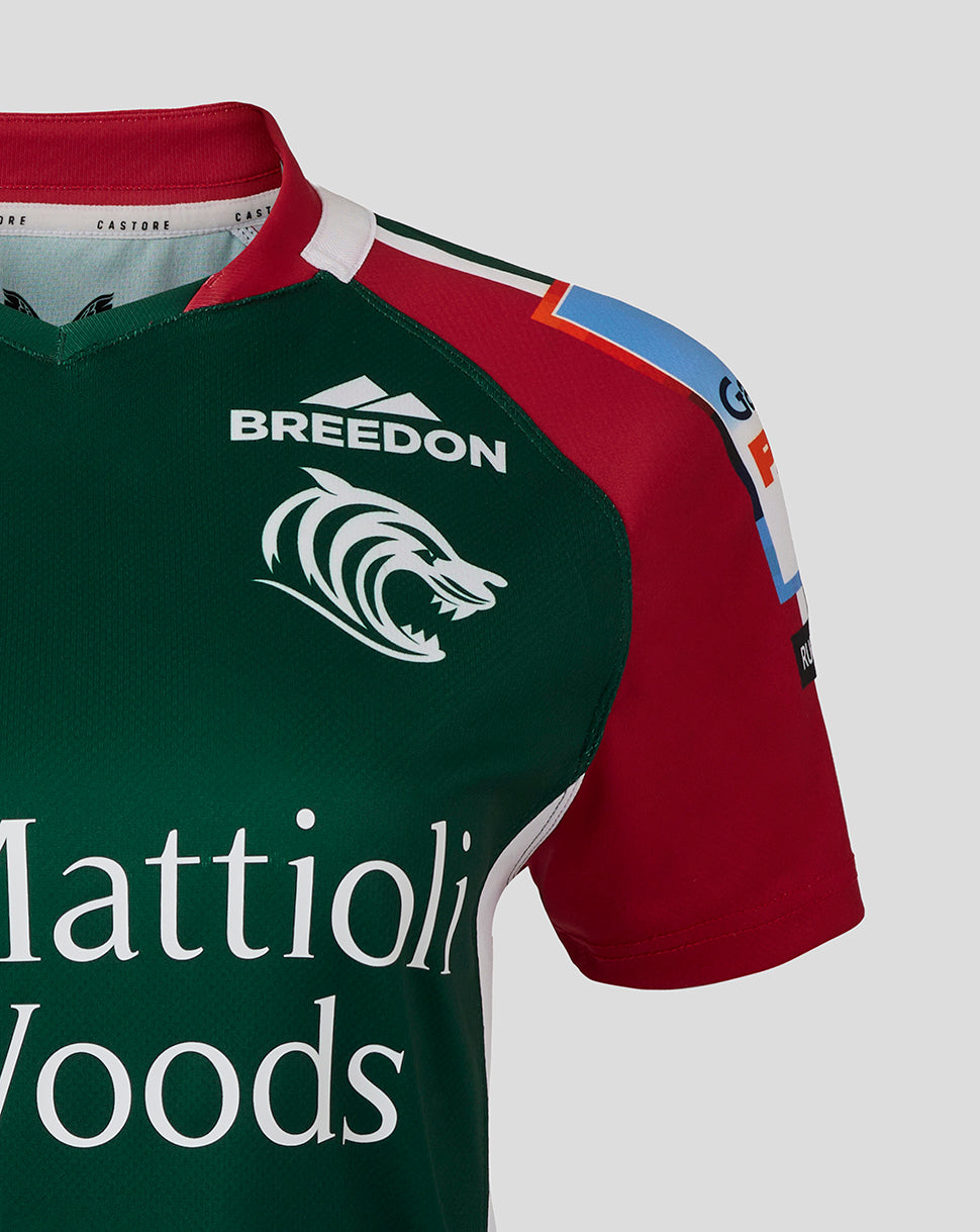 Chest area of Leicester Tigers replica shirt with Breedon logo and tiger emblem on dark green panel