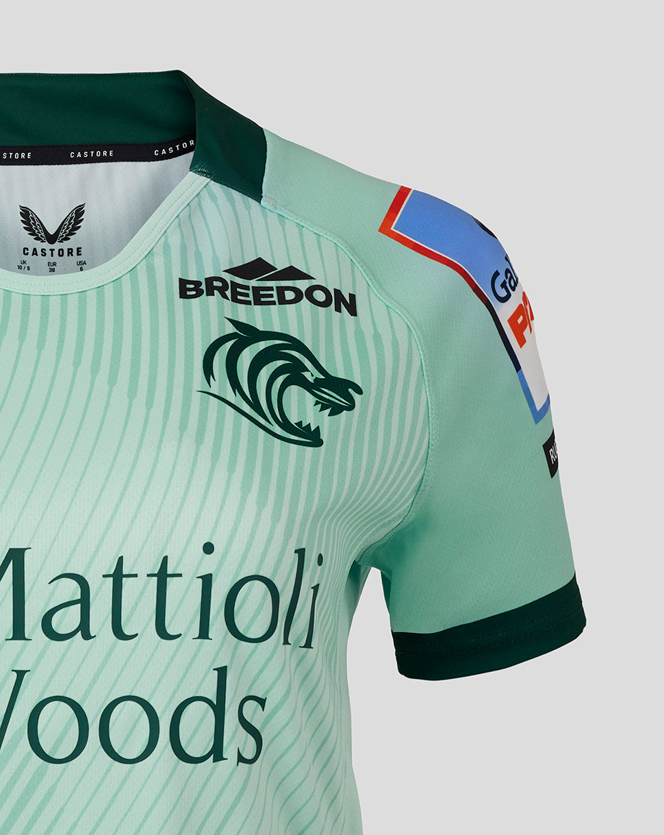 Mint green Leicester Tigers away shirt chest with Breeden logo and striped pattern.