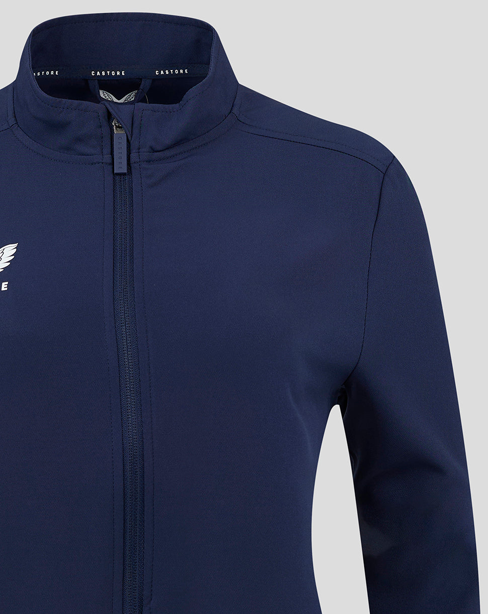 Navy track jacket with full front zipper and high collar showing Castore branding along the zip