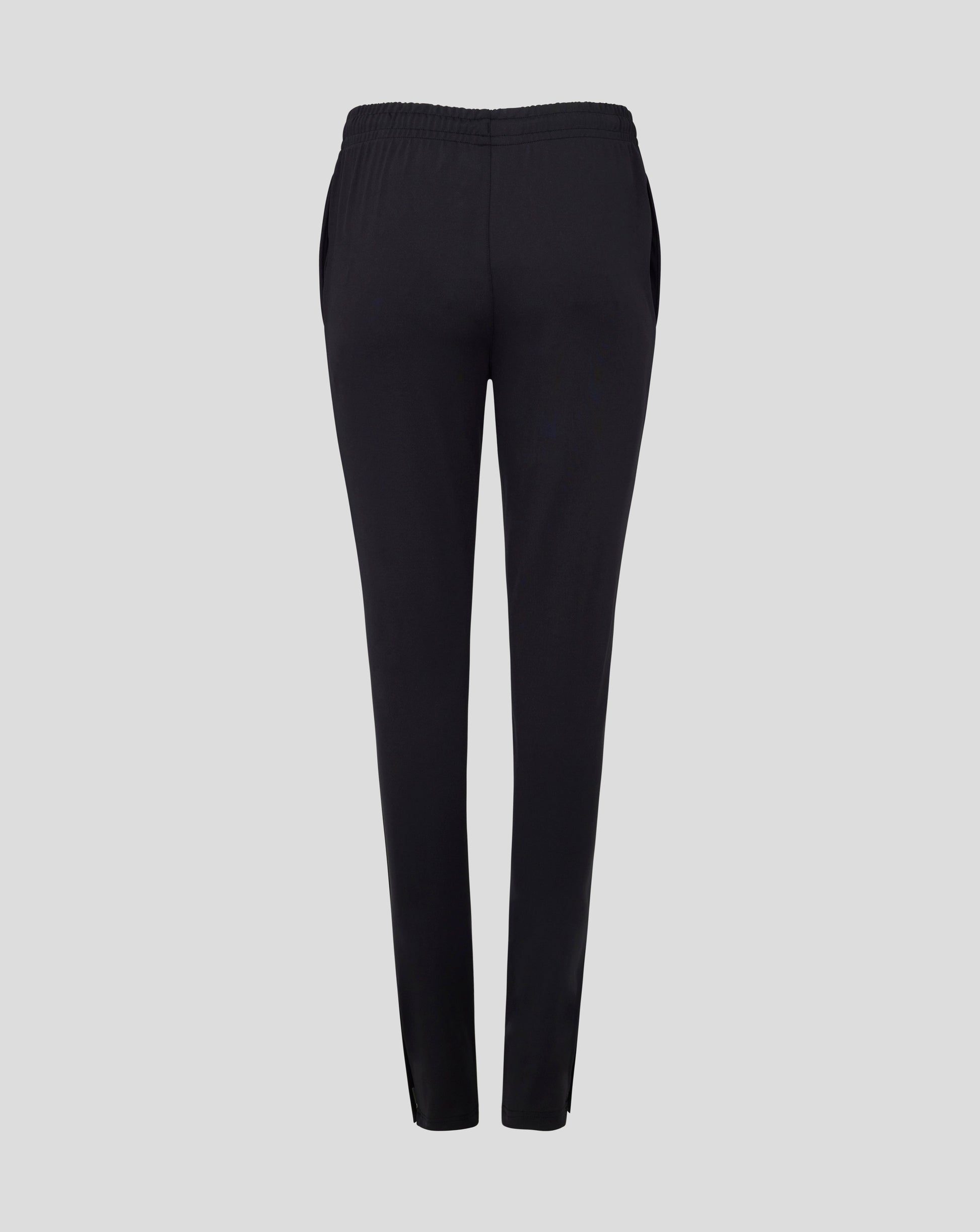 Back view of black Slim Fit Pant featuring an elastic waistband and smooth silhouette