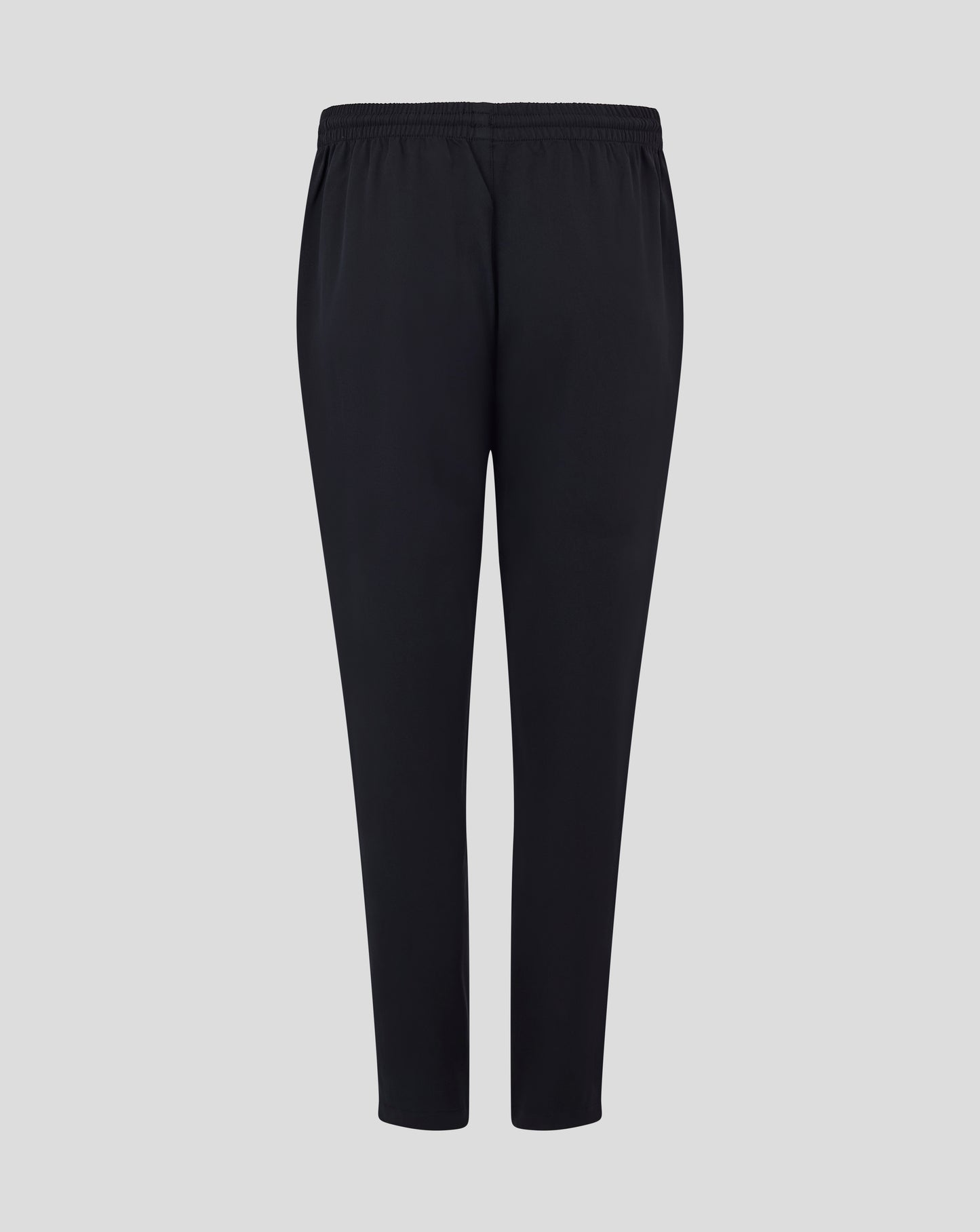 Back view of black track pants with elastic waistband