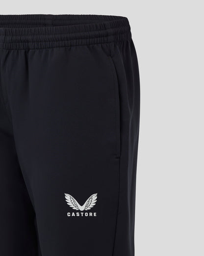 Close up of black womens track pant waist showing drawcord and heat sealed Castore logo on the leg