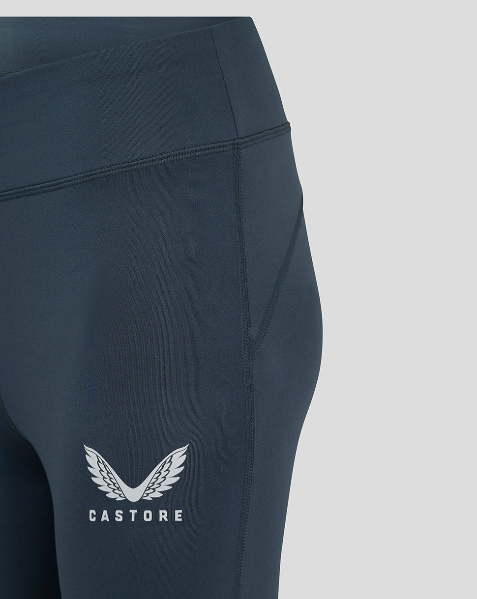 Close-up of dark slate leggings waistband and side seam details