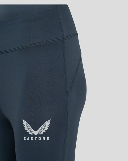 Close-up of dark slate leggings waistband and side seam details