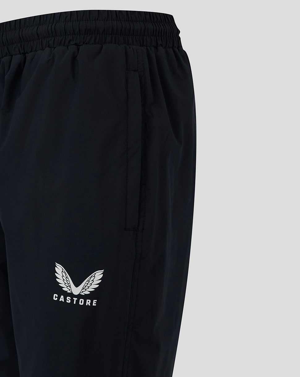 Close-up of black Womens Rugby Contact Pant showing elastic waistband and Castore logo on the leg