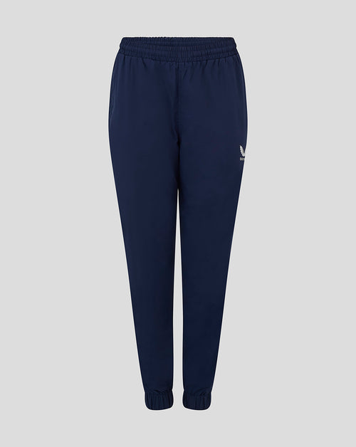 Front view of navy Womens Rugby Contact Pant with elastic waistband and cuffs, internal drawcord, water repellent fabric and Castore logo on the thigh