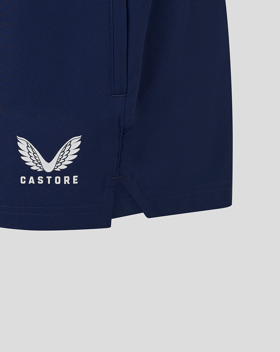 Castore logo with wings on the navy short leg