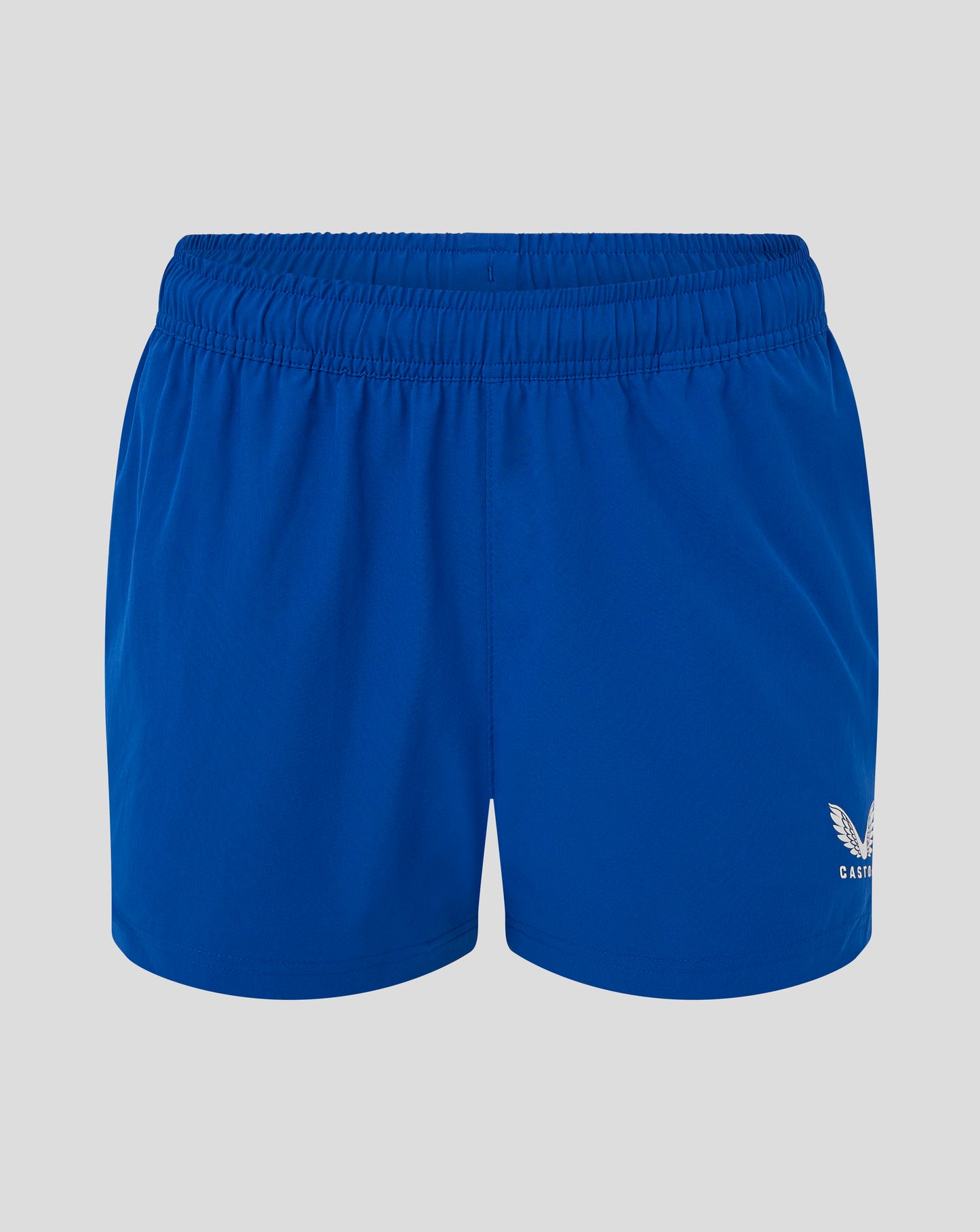 Close-up of blue woven training shorts waistband with elastic band and visible Castore crest on the leg.