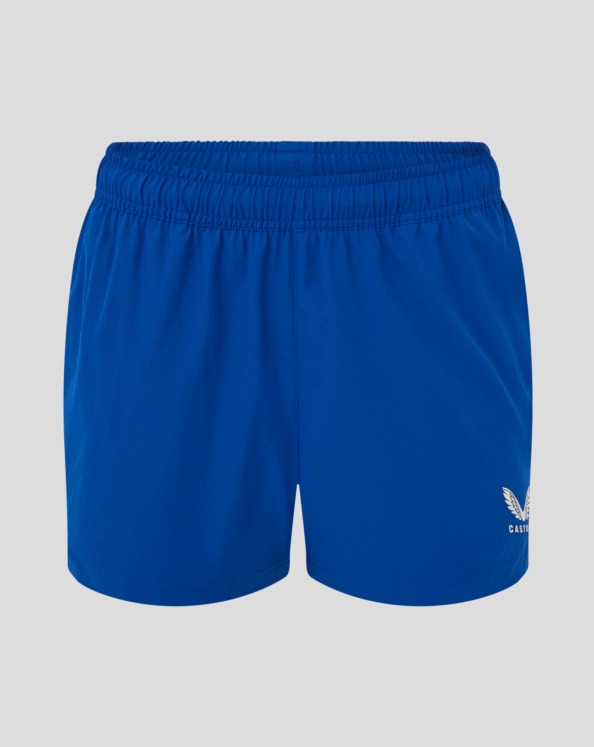 Close-up of blue woven training shorts waistband with elastic band and visible Castore crest on the leg.