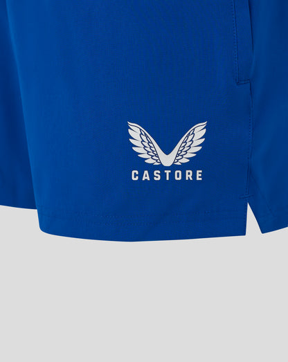 Blue woven training shorts back view showing the white Castore logo on the fabric