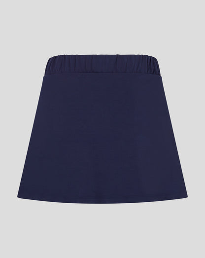 Rear view of navy Castore skort with elasticated waistband