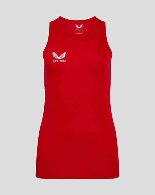 Front view of red womens training vest with crew neck and white Castore logo on the chest