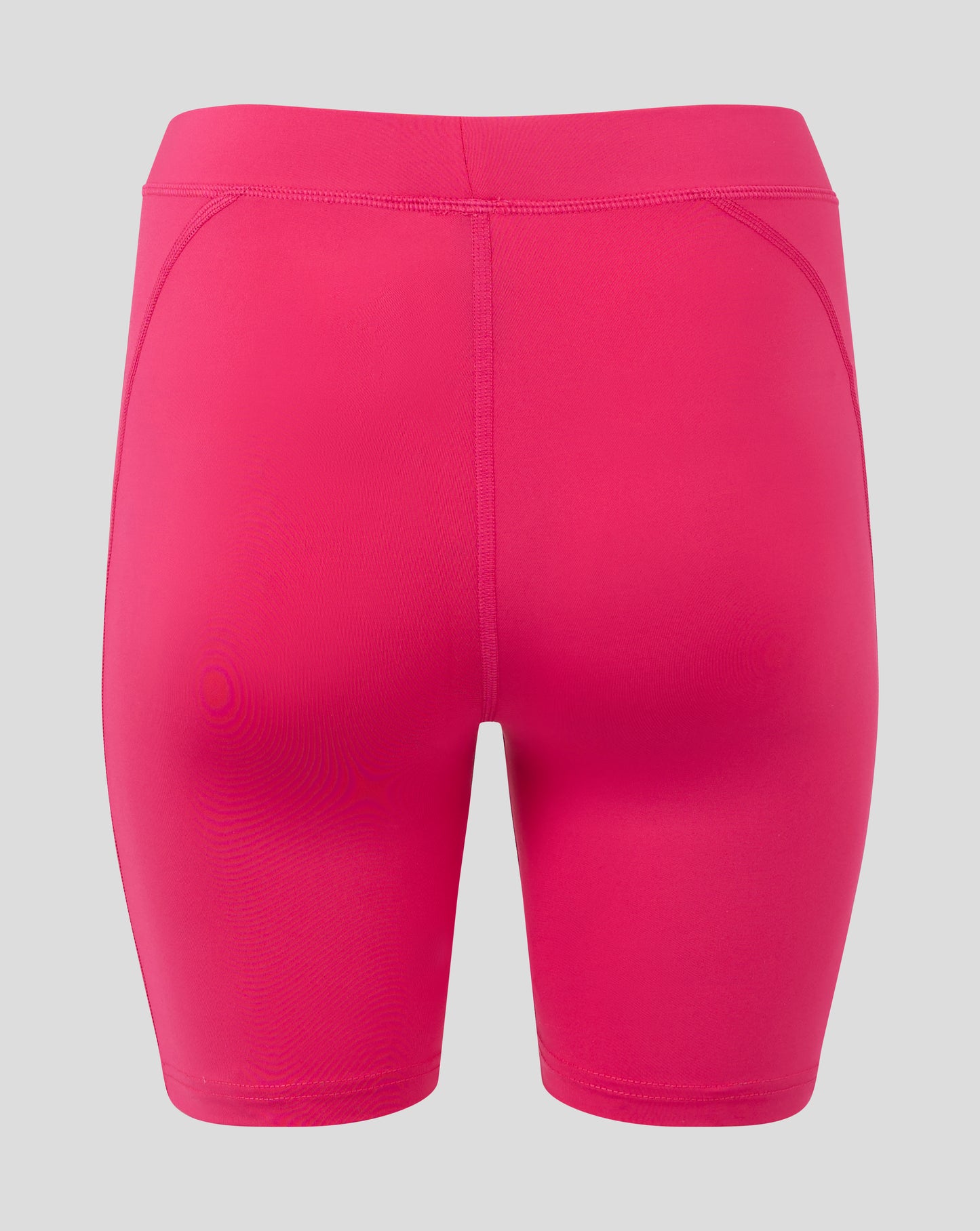 Rear view of Beetroot Purple women's baselayer shorts showing folded waistband and flatlock seams.
