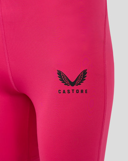 Close-up of Beetroot Purple baselayer fabric with a black winged Castore logo on the leg panel.