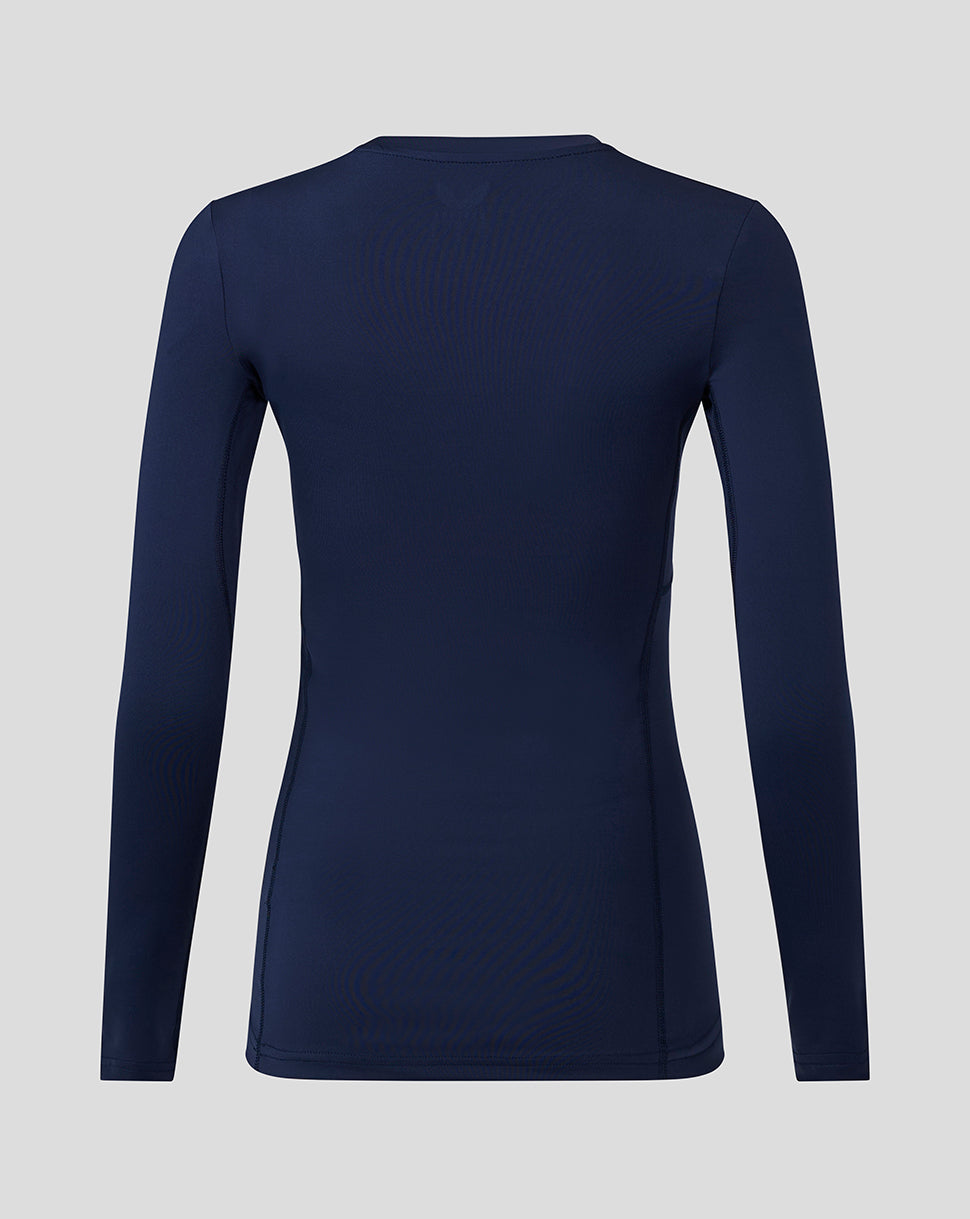 Back view of navy Baselayer Long Sleeve Top with clean silhouette and seam detailing