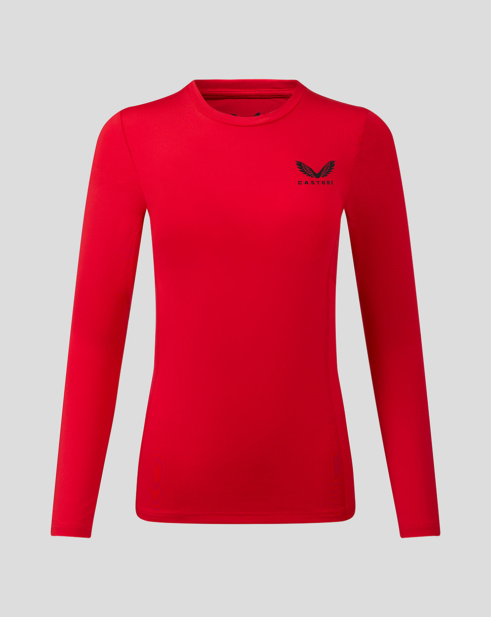 Front view of red womens Baselayer long sleeve top with Castore logo on chest