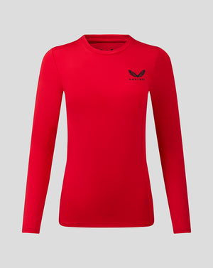 Front view of red womens Baselayer long sleeve top with Castore logo on chest
