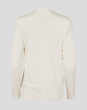 Back view of Cannoli Cream cricket jumper with a mesh back panel