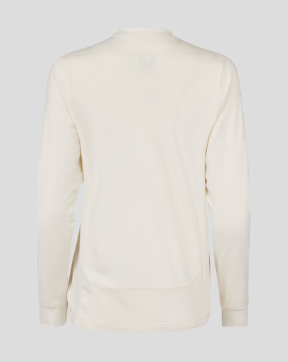 Back view of Cannoli Cream cricket jumper with a mesh back panel