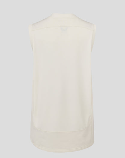 Back view of Cannoli Cream sleeveless cricket jumper with mesh back panel