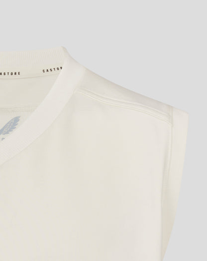 Front view of Cannoli Cream jumper with large black crest eagle logo and Castore branding