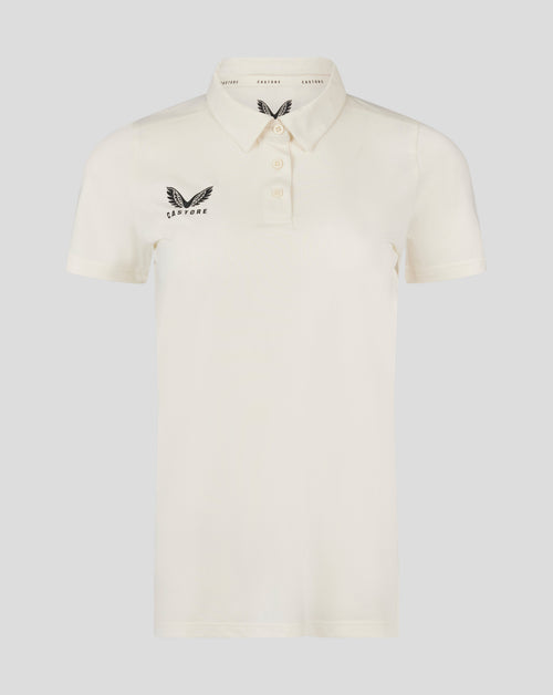 Womens Cricket Tech Playing Shirt Cannoli Cream front view with three button placket and Castore logo