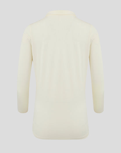 Back view of Cannoli Cream long sleeve cricket tech playing shirt in cream showing clean rear panel
