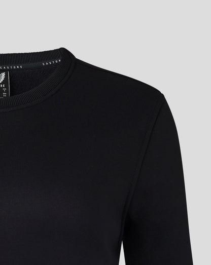 Front view of black Womens Brushback Sweatshirt in Caviar with white wing emblem and Castore branding on the chest