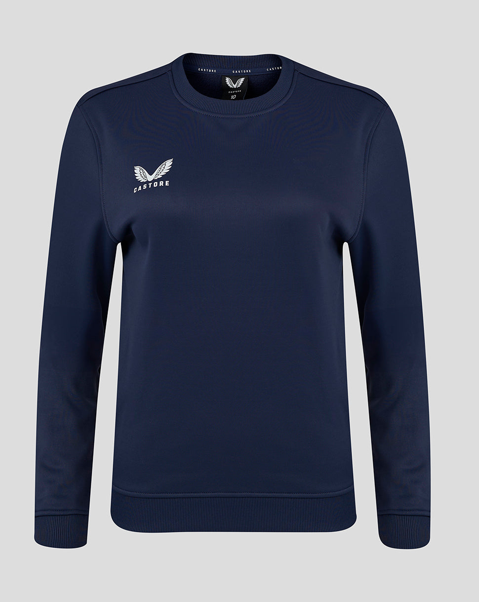 Front view of navy women's Brushback Sweatshirt with Castore logo on the left chest.