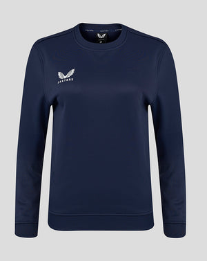 Front view of navy women's Brushback Sweatshirt with Castore logo on the left chest.
