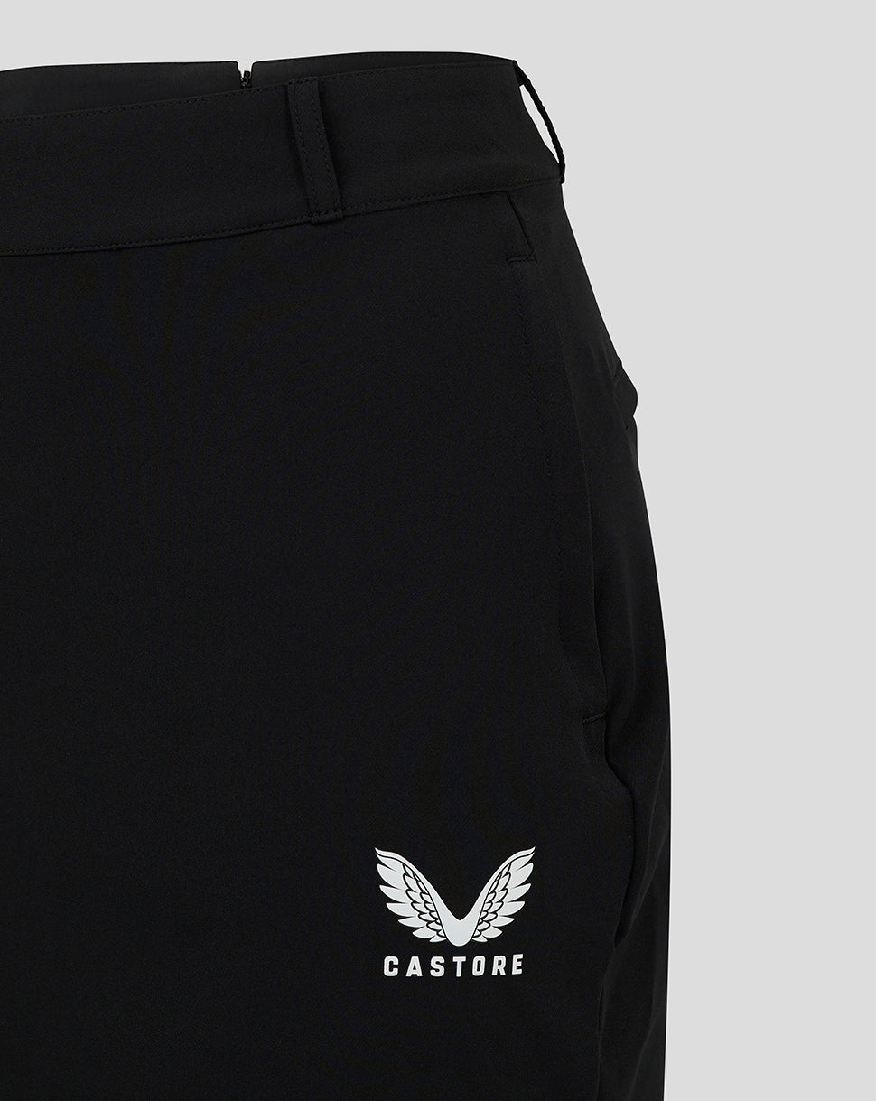 Close-up of waistband with belt loops and back zipper on black chino skirt