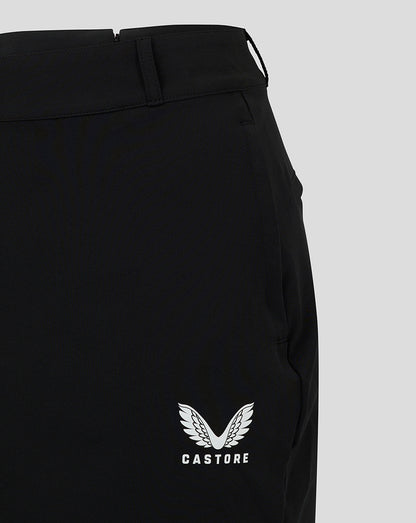 Close-up of waistband with belt loops and back zipper on black chino skirt