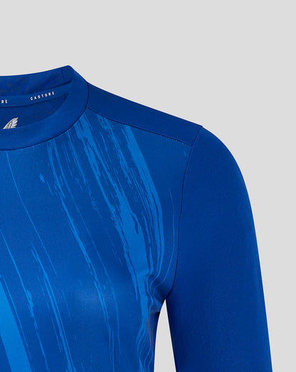 Close up of a royal blue long sleeve T shirt with an abstract brushstroke pattern on the front