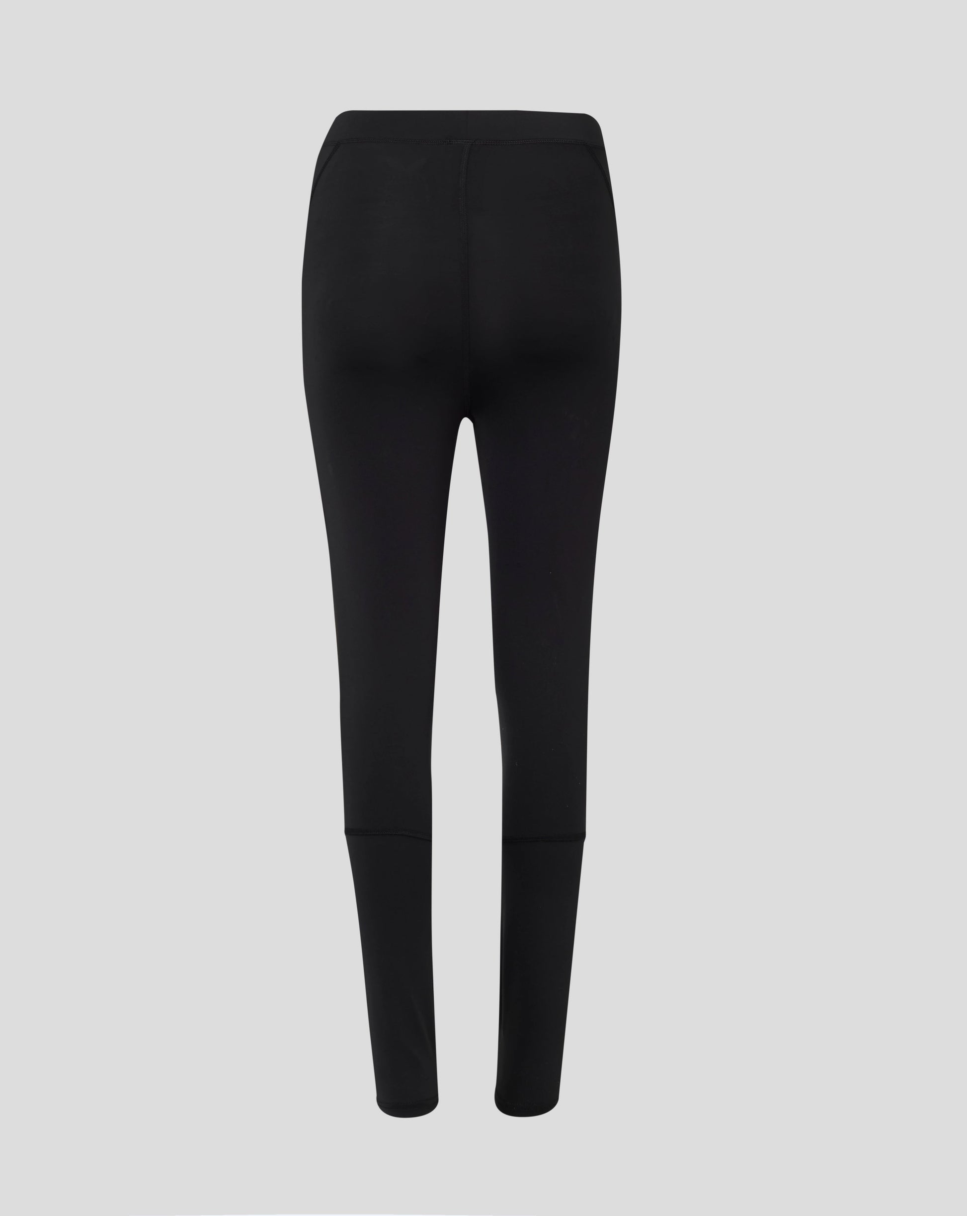 Back view of black Baselayer Legging highlighting self fabric folded waistband and flatlock seams