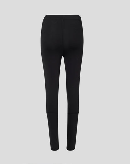 Back view of black Baselayer Legging highlighting self fabric folded waistband and flatlock seams