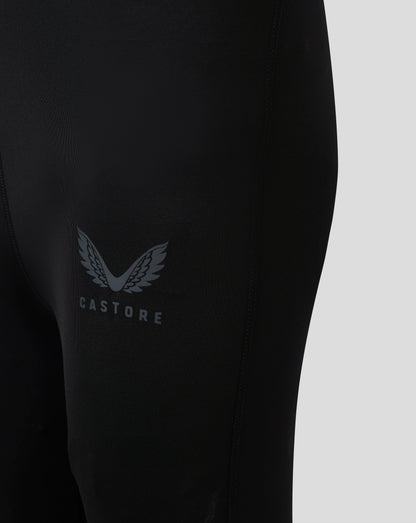 Close up of black Baselayer Legging showing Castore logo with laurel wings on the thigh