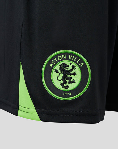 Close-up of neon green Aston Villa crest embroidery on black goalkeeper shorts