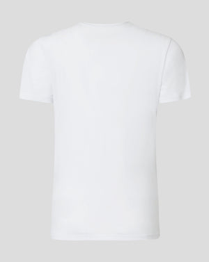 Back of neck on white tee with Castore logo tape along the collar.